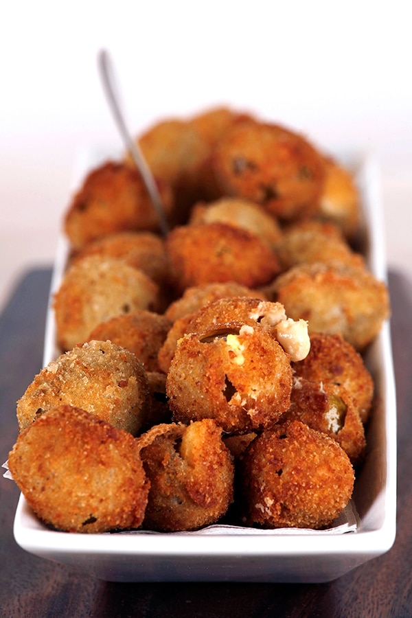 Crispy Provolone Stuffed Olives on White Dish  