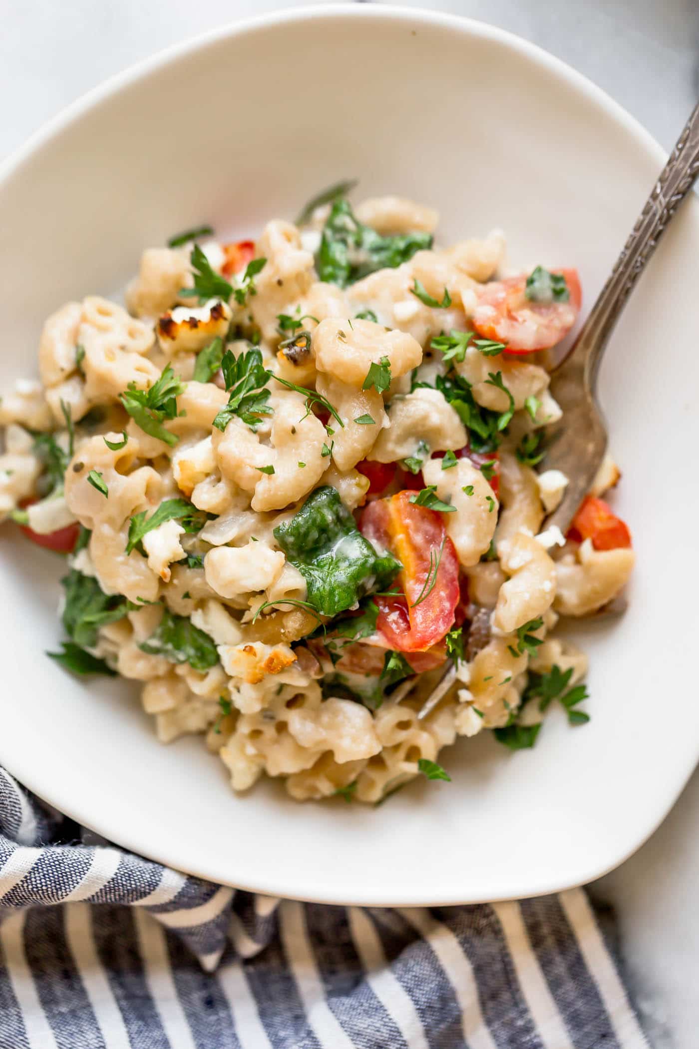 Pasta pictured with parsley and cheese