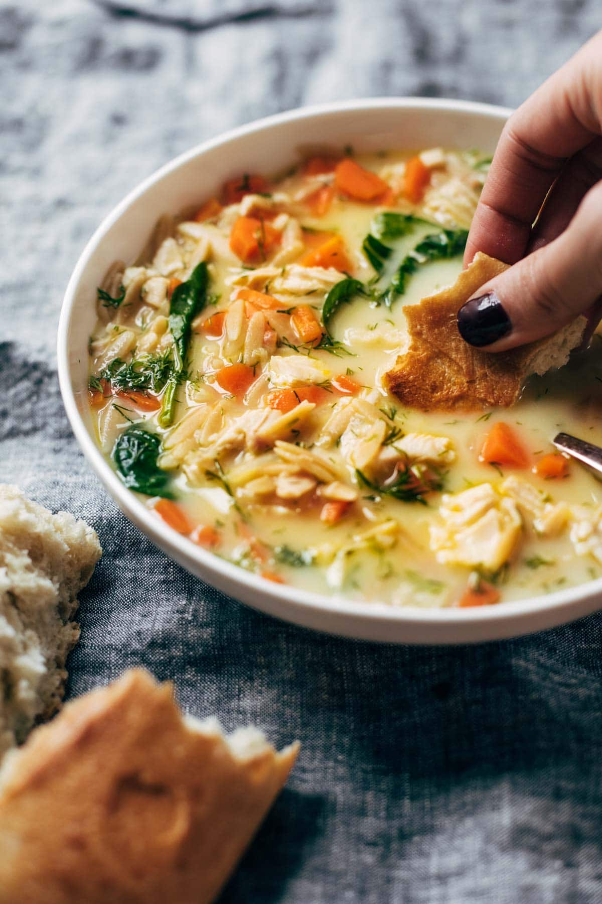 Bowl of lemon chicken orzo soup