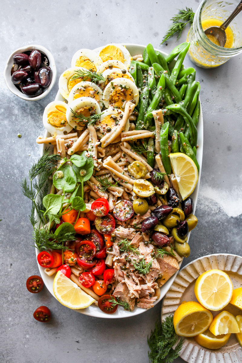 Tuna Pasta Salad placed on a white platter