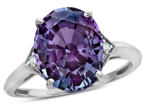 Star K Large Oval 12x10 Simulated Alexandrite 3 Stone Trillion Setting Ring - 316239A55