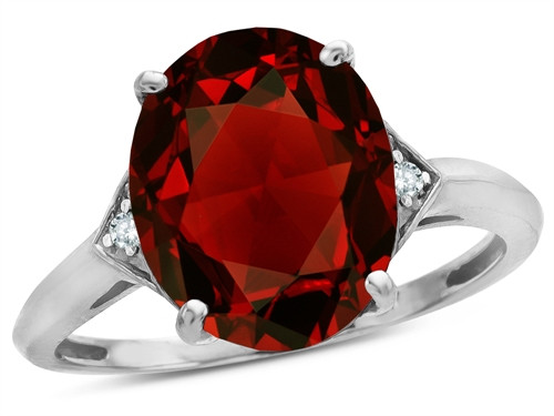 Star K Large Oval 12x10 Genuine Garnet 3 Stone Trillion Setting Ring - 316234A5