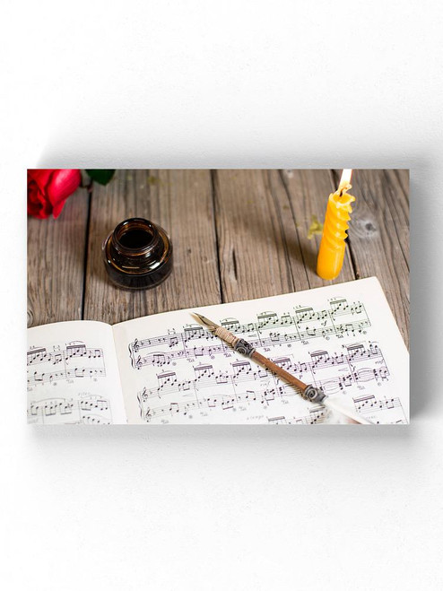 Writing A Score Of Piano Music Wrapped Canvas -Image by Shutterstock