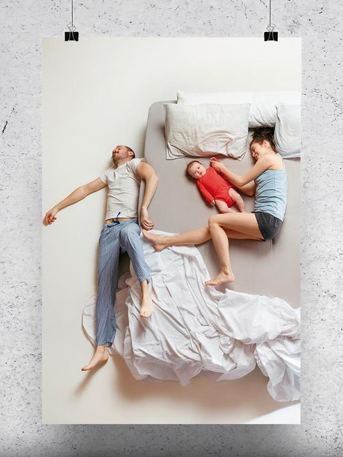 Family With Newborn Child In Bed Poster -Image by Shutterstock