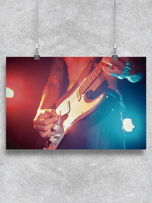 Playing The Guitar. Poster -Image by Shutterstock