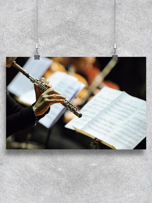 Woman Playing The Flute. Poster -Image by Shutterstock