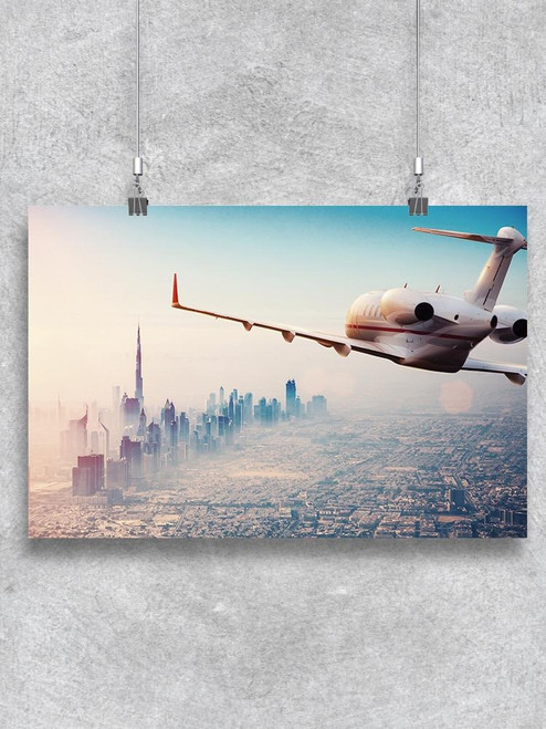 Private Jet Flying Above City Poster -Image by Shutterstock