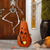 23.5" Orange and Black Halloween Metal Jack O Lantern with LED Pillar Decor