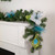 Peacock Feather and Poinsettia Artificial Christmas Garland - 6' x 9" - Unlit