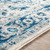 7.8' x 10.25' Beige and Peacock Blue Distressed Finished Rectangular Area Throw Rug