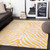 5.25' x 7.25' Animal Printed Yellow and Beige Rectangular Area Throw Rug