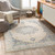 5' x 7.5' Oriental Patterned Ivory and Blue Rectangular Area Throw Rug