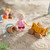 HABA Little Friends Baby Nora - 2.5" Dollhouse Toy Figure with Wagon and Pail