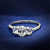 Women's Rhodium Finish Sterling Silver Engagement Ring with Oval Clear CZ Stones - Size 7