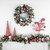 Frosted Pine Artificial Christmas Wreath with Swirled Candy Ornaments, 24-Inch