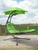 84” Green Outdoor Lounge Chair with an Overhanging Umbrella