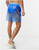 ASOS DESIGN swim shorts in clear blue with brief inner mid length