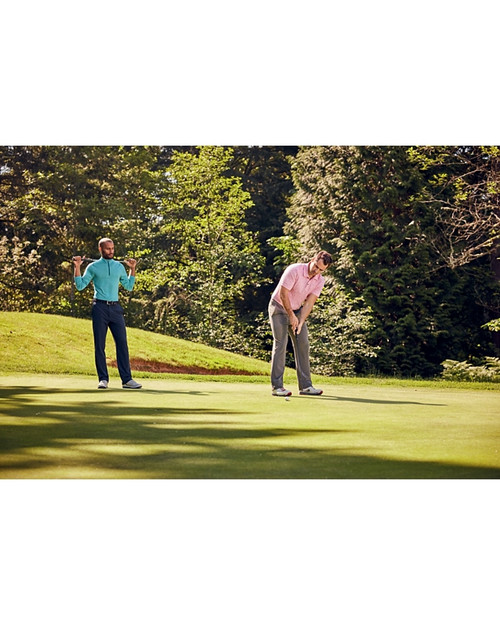 Two men golfing