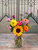 A Sunny Garden gathering, straight from the field. This bouquet brings the warmth of a summer farm stand right to your door