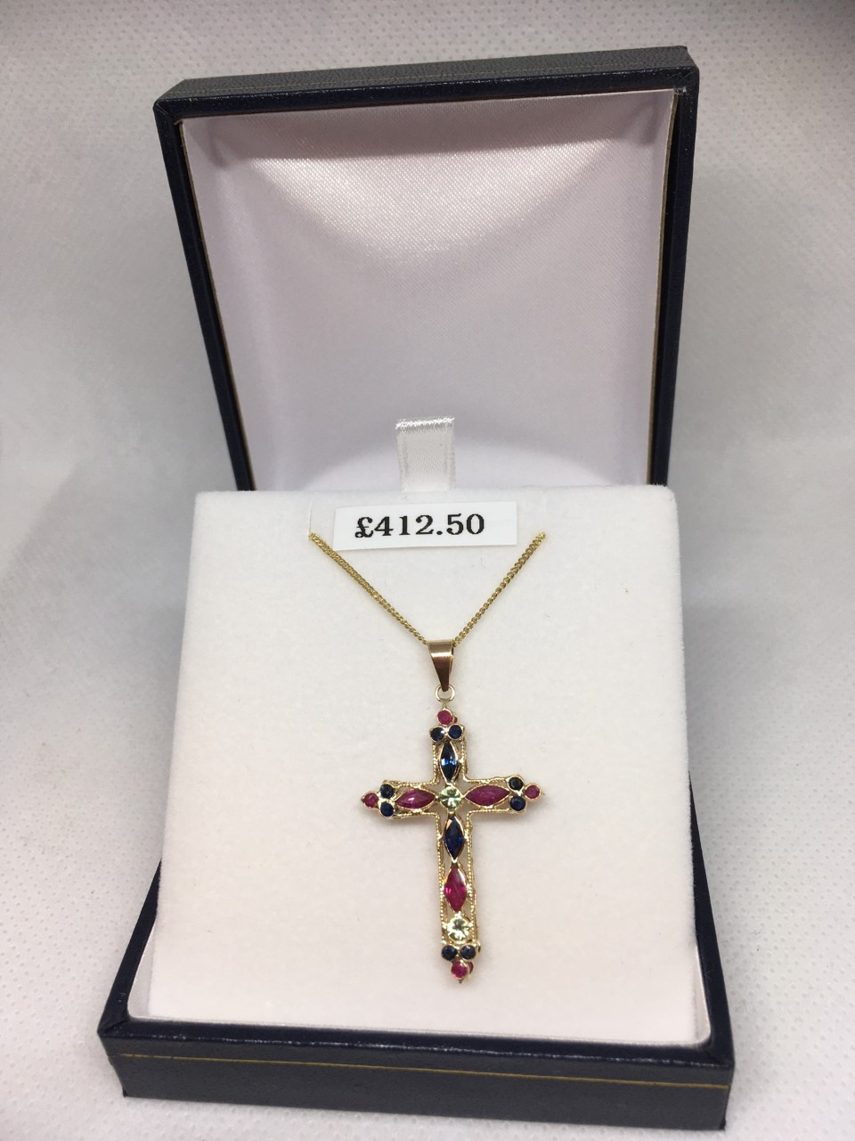 Diamond and sapphire cross on sale pendant