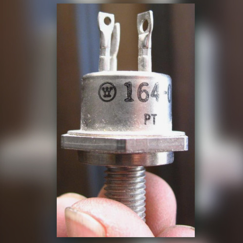 Westinghouse 164-09 stud mount power transistor held in hand, W logo and PT marking visible