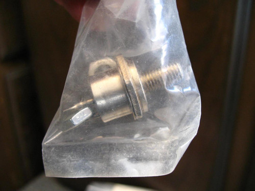 Westinghouse Transistor 164-10 stud-mount component sealed in a clear plastic bag, showing the threaded bolt and leads.