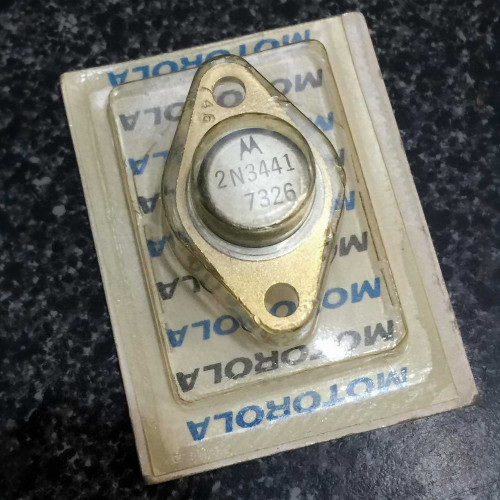 Motorola 2N3441 power transistor in a gold TO-3 package sealed in original manufacturer's blister pack.