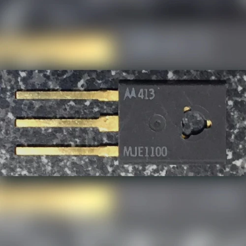Motorola MJE1100 transistor marked face with logo and part number, leads extending left