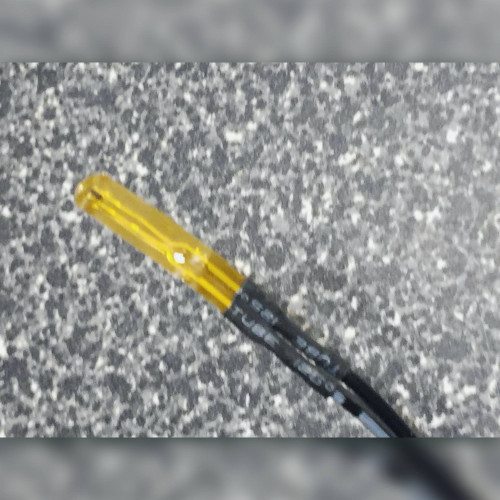 Close-up of TTF-103 NTC thin-film thermistor head and heat-shrink junction.