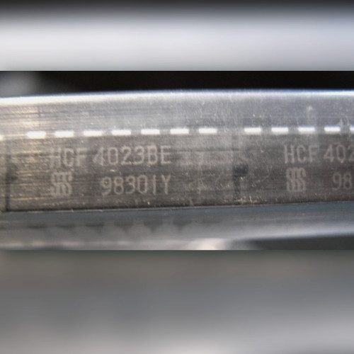 Two HCF4023BE chips end to end in a clear tube, SGS logo on each