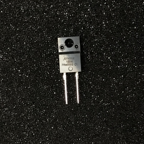 Two-lead full-pack diode with mounting hole, marked BY459X and 1500, on dark speckled surface