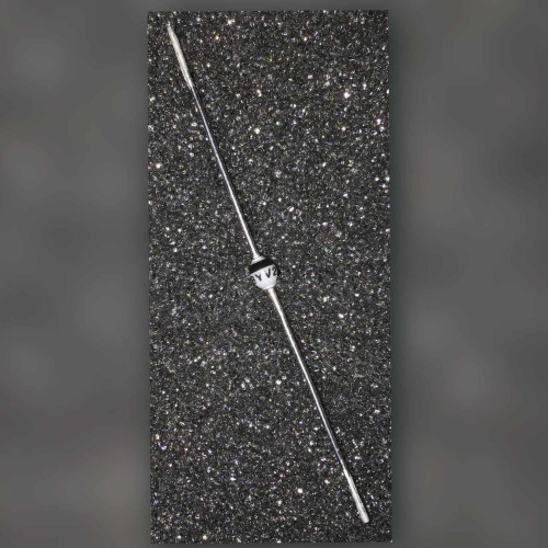 Axial rectifier diode on a dark speckled mat, white body with black band, marked BYV2