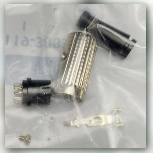 Disassembled 7-pole DIN in-line socket: bright metal shell, black boot, contact insert, clamp and screw