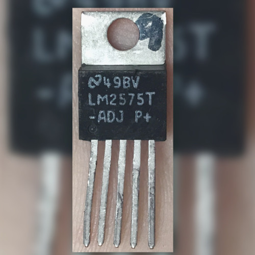 Texas Instruments LM2575T-ADJ voltage regulator in a 5-pin TO-220 package showing front markings.