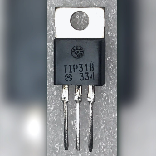 TIP31B with Motorola batwing and 334 on black TO-220 body, grey speckled background