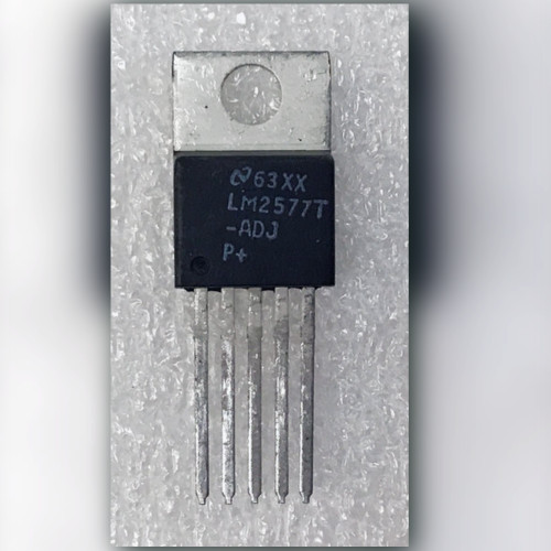 National Semiconductor LM2577T-ADJ five-lead TO-220 regulator, front marking visible on light background