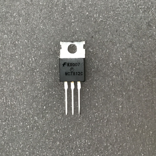 Fairchild logo FK0007 MC7812C marking. Leads are clean and straight, no visible damage or corrosion.