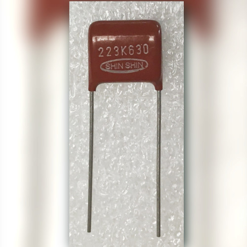 Shin Shin 223K630 metallized film capacitor close-up showing body marking and oval SHIN SHIN wordmark