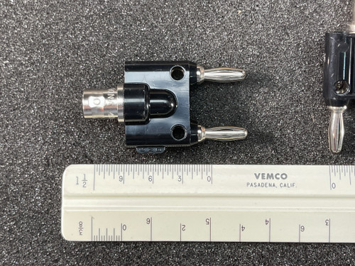 Pomona 1269 BNC female to dual banana plug adapter beside Vemco ruler for scale