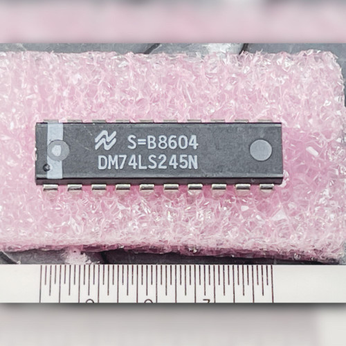 National Semiconductor DM74LS245N IC chip top view with scale ruler.