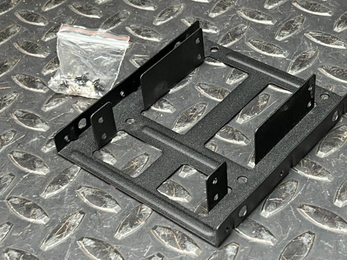 Qook X001JLINVD black metal dual SSD bracket at an angle with bag of mounting screws