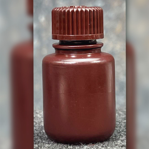 Nalgene 02-923-5A amber HDPE bottle with screw cap, upright view.
