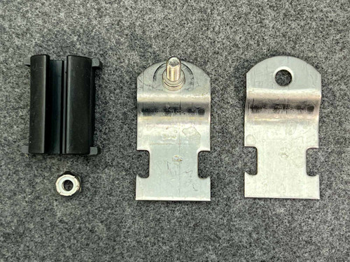 Swagelok SS-TBC12 tube support bracket parts: two plates, black cushion, hex locknut