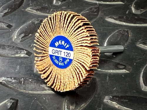 Merit flap wheel face showing blue GRIT 120 and 30,000 MAX RPM label