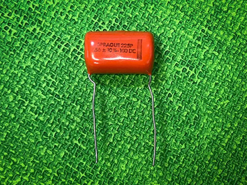 SPRAGUE 225P .56 ± 10% 100 DC text clear leads straight and clean no visible damage.