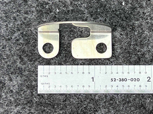 Federal Pacific F31.5 thermal overload heater element, a shiny metallic bent flat plate component with a distinctive Ushape, featuring two circular mounting holes. The F31.5 heater element is precisely measured against a ruler, showing it is approximately 1.75 inches long, and is typically used for motor starter overload protection.