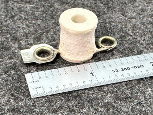 Allen-Bradley N12 Type N thermal overload heater element next to a ruler for scale.