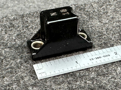 Allen-Bradley N18 Type N thermal overload heater element with a ruler for scale.