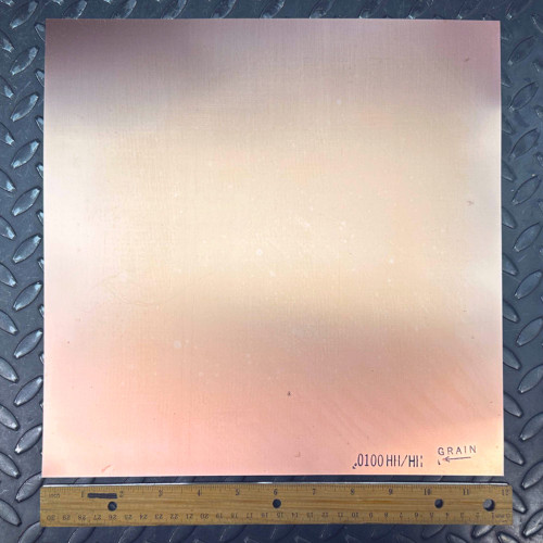 PartsMine 12x12-010-HHHH copper clad laminate board with a 12-inch ruler and corner markings.