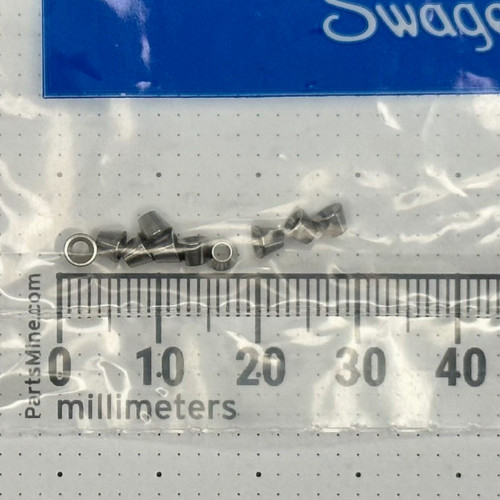 Swagelok SS-103-1 stainless front ferrules, ten pieces loose in original poly bag above PartsMine millimeter ruler